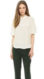 Land039AGENCE Rolled Neck Flutter Sleeve Blouse at Shopbop