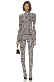 Long Sleeve Open Back Catsuit With Footsie at Revolve