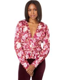 Long Sleeve Peplum Top at Zappos