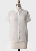 Maggie's white blouse at Ruche