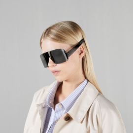 Mask-shaped frame sunglasses in shiny black injection US at Gucci