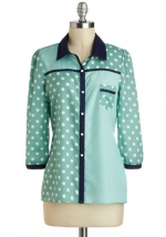 Mindy's mint polka dot shirt at Modcloth