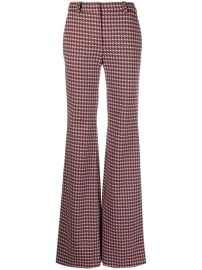 Moschino graphic-print Flared Trousers - at Farfetch