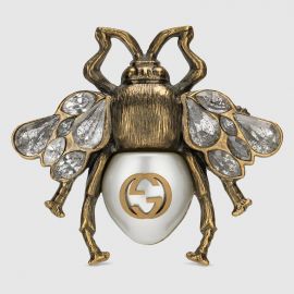 Multi-finger ring with bee at Gucci