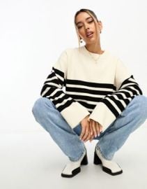 NA-KD round neck striped sweater in white and black at ASOS