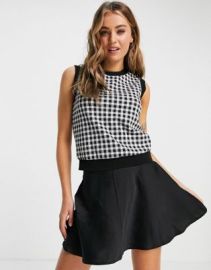 New Look crew neck gingham knitted tank top in black check at ASOS