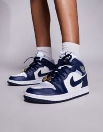 Nike Air Jordan 1 Mid sneakers in white and navy at ASOS