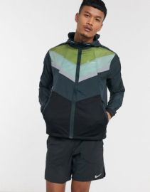 Nike Running wild run retro track jacket in blue at ASOS