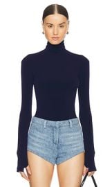 Norma Kamali Slim Fit Long Sleeve Turtleneck Top In True Navy at Revolve