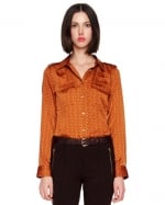 Orange blouse like Robins at Neiman Marcus