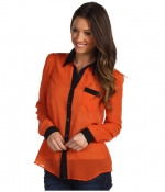 Orange shirt with contrasting collar at 6pm