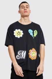 Oversized Multi Placement Graphic T-shirt at Boohoo