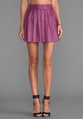 Pleated leather skirt in mulberry by Alice and Olivia at Revolve