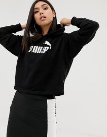 Puma Essentials cropped black hoodie at Asos