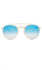 Ray-Ban Round Double Bridge in Gold  amp  Blue Gradient Flash from Revolve com at Revolve