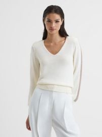 WornOnTV: Brooke’s white v-neck sweater with metallic striped sleeves ...