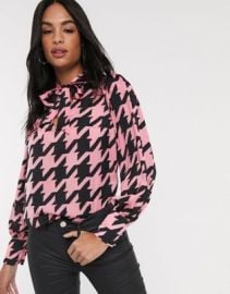 River Island houndstooth pussybow blouse in pink at ASOS