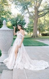 Romantic Off-the-Shoulder A-Line Lace Wedding Dress with High Skirt Slit at Essense Designs