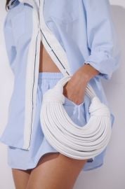 SOMETHING SPECIAL FAUX LEATHER PURSE IN WHITE AKIRA at Akira