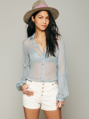 Sheer polka dot blouse at Free People