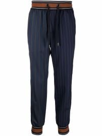 WornOnTV: Robyn’s navy coat and pinstripe jacket and pants set on The ...