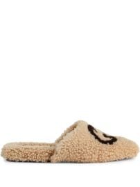 Shop Gucci Interlocking G shearling flat slippers with Express Delivery - at Farfetch