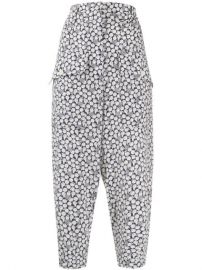 Shop Stella McCartney orange-print cropped trousers with Express Delivery - at Farfetch