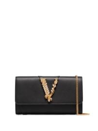 Shop black Versace Virtus crystal embellished clutch bag with Express Delivery - at Farfetch