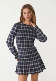 Short check dress with ruffles at Stradivarius
