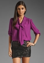 Similar purple blouse at Revolve