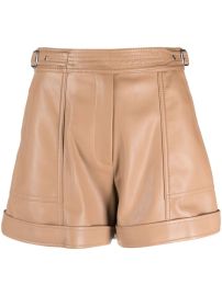 Simkhai Buckle fastening faux leather shorts at Farfetch