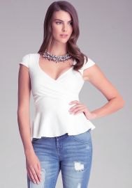 Solid Peplum Top in white at Bebe