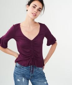  Solid Ruched Peplum Top at Aeropostale