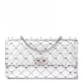 Specchio Rockstud Spike Quilted Leather Clutch by Valentino at Fashionphile