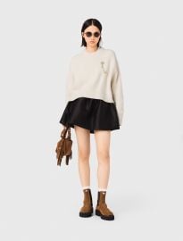 Sweater with floral brooch at Maje