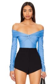 The Andamane Kendall Bodysuit in Deep Denim at Revolve