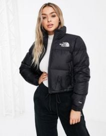 The North Face Nuptse cropped jacket in black at ASOS