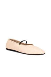 The Row Elastic Ballet Flats in Milk FWRD at FWRD