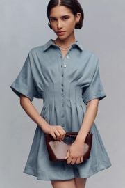The Tobie Faux Suede Mini Shirt Dress By Exquise at Anthropologie