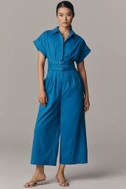 The Tobie Pleated Jumpsuit By Exquise Double Buckle Edition at Anthropologie