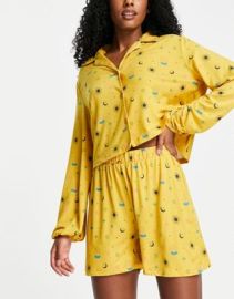 The Wellness Project x Chelsea Peers blouson sleeve short pajamas in mustard ditsy eye print at ASOS