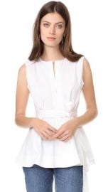 WornOnTV: Carissa’s white split-neck top on E! News Daily Pop | Carissa ...