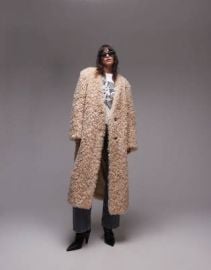 Topshop faux fur collarless long coat in honey at ASOS