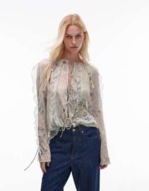 Topshop ruffle sleeve sheer tie front top in blue lace floral print at ASOS