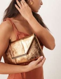 True Decadence metallic clutch bag in bronze at ASOS