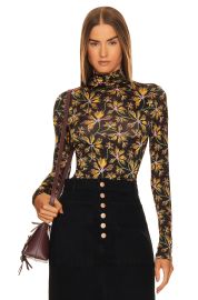 Ulla Johnson Aurelia floral print stretch jersey turtleneck top at Revolve