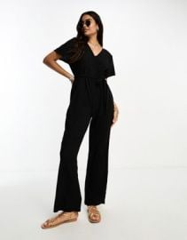 Sleek and Chic: How to Master the Art of the Black Jumpsuit à la Hope ...