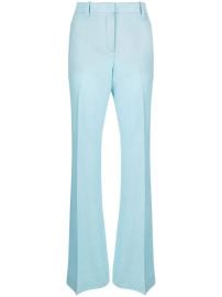 Versace Allover jacquard flared wool trousers at Farfetch