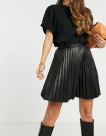 Vila leather look pleated mini skirt in black at ASOS