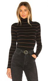 Vince Striped Rib Turtleneck in Black  amp  Ambrette from Revolve com at Revolve